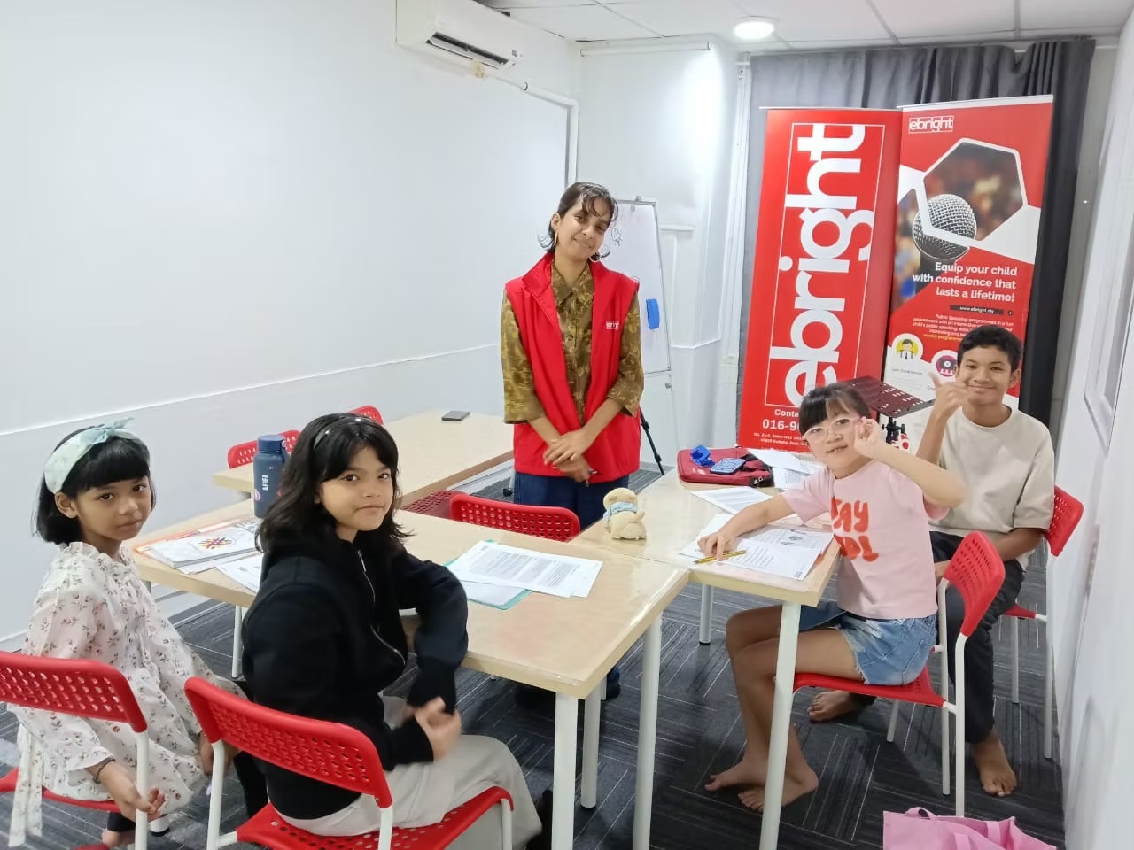 Children engaging in a weekly public speaking class