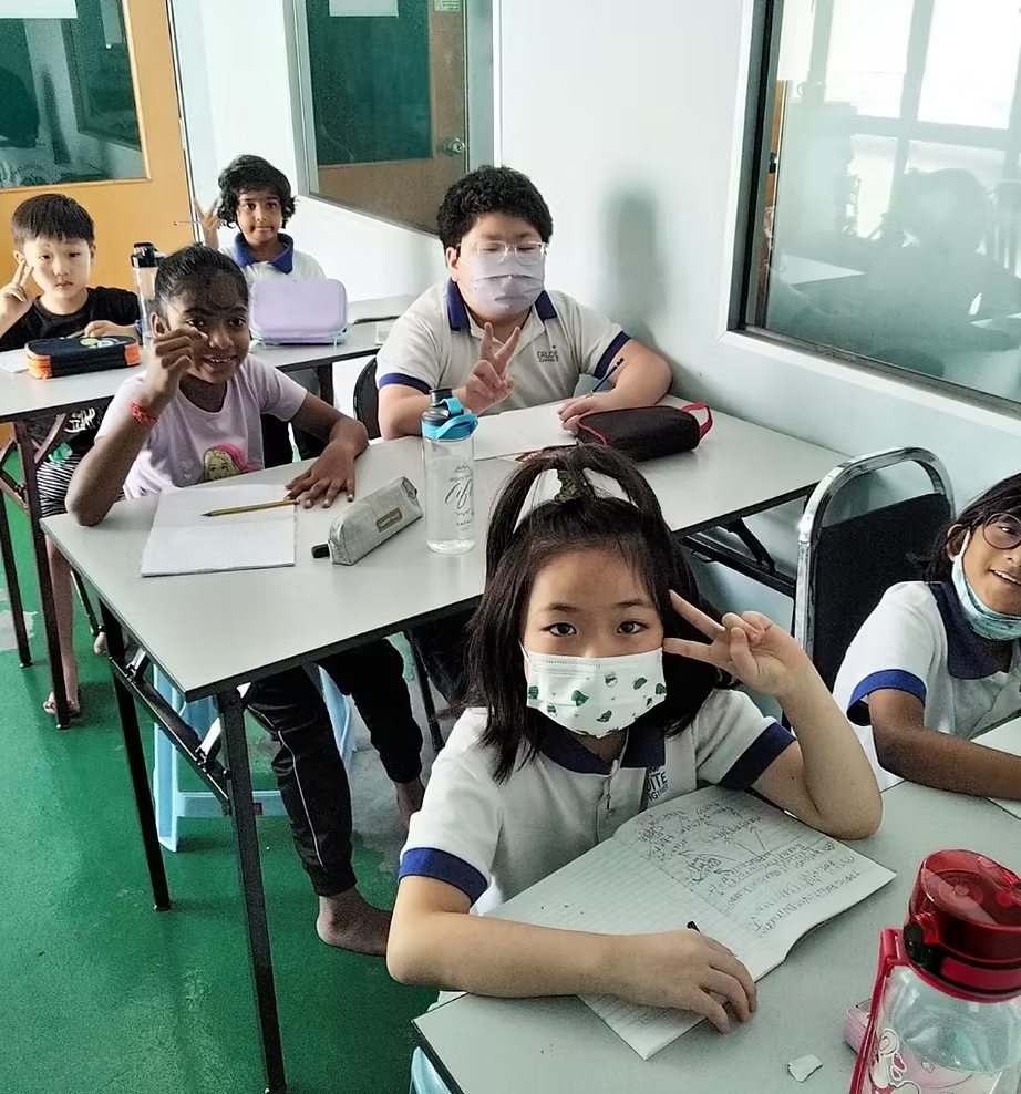 Students engaged in a school workshop session