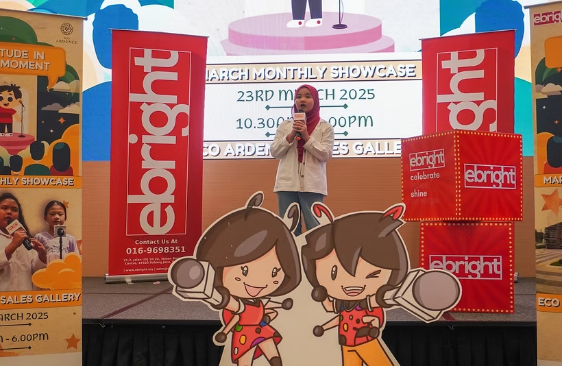 Student speaking confidently in front of a backdrop